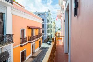 a view of an alley between two buildings at Casa Las Ruinas Boutique Hotel in San Juan