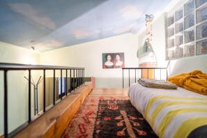 a bedroom with a bed and a rug on the floor at Granducato di Monteballante in Pesaro +114 photos