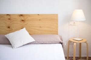 A bed or beds in a room at Cas Conco