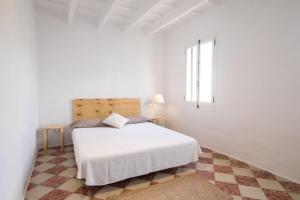 A bed or beds in a room at Cas Conco Még 29 kép