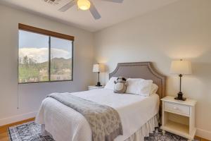 a bedroom with a bed with a teddy bear on it at Fire Pit & Large Yard! Luxury Anthem Escape in Anthem +31 photos
