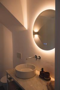 a bathroom with a sink and a mirror at Vale De Água Equestrian Resort in Odemira +38 photos
