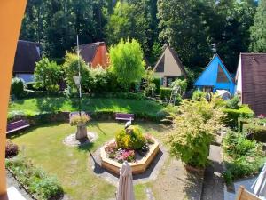 an aerial view of a garden with houses at Gite Pinot Blanc n°3 à Kaysersberg in Kaysersberg
