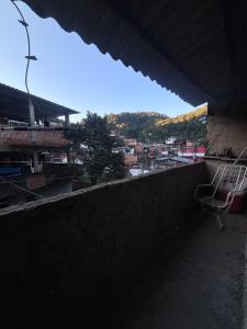 a view of a city from the roof of a building at Beco 6 in Petrópolis +2 photos