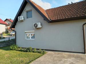 a house with a speaker on the side of it at Ema in Bajina Bašta