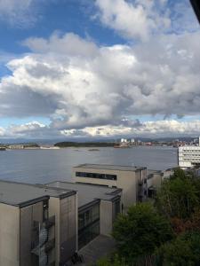 a view of a large body of water with buildings at Central apartment for ONS in Stavanger