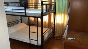 a couple of bunk beds in a room at The Doctor's Quarters DQ in San Fernando