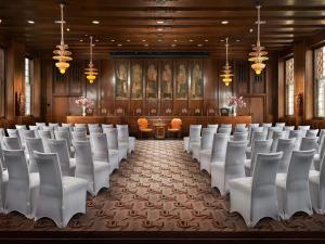a room with rows of chairs in a building at Sofitel Legend The Grand Amsterdam in Amsterdam +238 photos