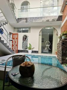 a room with a table and a swimming pool at Sol de sauce - Casa Vacation Stay in Sauce