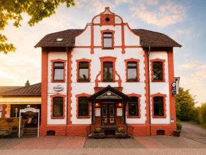 an old building with a turret at Gasthof Schausten in Kreuztal