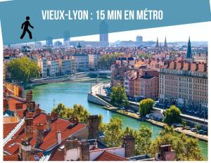 a view of a city with a river and buildings at Lyon funky flat piscine et parking in Tassin-la-Demi-Lune