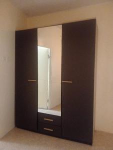 a large mirror on a wall in a room at Maison traditionnelle cadablabca centre in Casablanca +4 photos