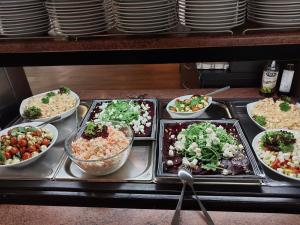 a buffet with many different dishes of food at Parkhotel Sokolov in Sokolov