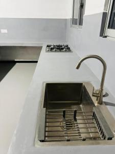 a sink in a kitchen with a sink at Yalora Villa Kataragama in Kataragama