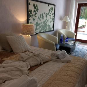 
Säng eller sängar i ett rum på Solrosen i Simrishamn
