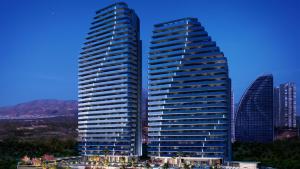 two tall buildings next to each other in a city at Sunset Cliffs - Vida de Luxury in Benidorm +37 photos