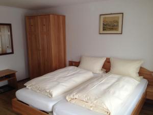 Cama o camas de una habitación en Cafe Pension Eckerbrunn