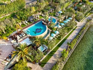 an aerial view of the pool at the resort at Belfiore Park Hotel 4Stars Superior "Adults Only" in Brenzone sul Garda