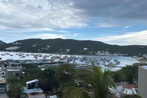 a view of a harbor with boats in the water at Villa Dolce Mare in Arraial do Cabo
