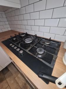 a stove top oven sitting on top of a counter at The Carnation in Grays Thurrock