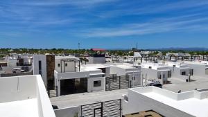 arial view of a city with white buildings at 3BR House with Pool & Rooftop Terrace in El Centenario