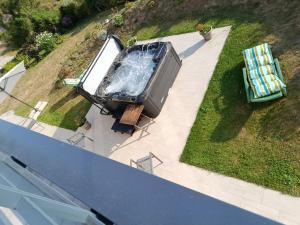 an aerial view of a pool in a yard at Chez ALAIN & PATRICK in Vauville