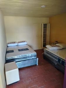 a room with two mattresses sitting on the floor at Alto Luna casa de campo in La Tebaida