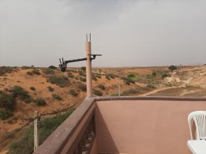 a view of the desert from the roof of a building at انوايزم in Tiznit