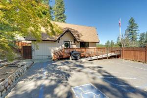 a house with a tennis court in front of it at Serene Cabin Retreat Between Murphys & Arnold in Murphys