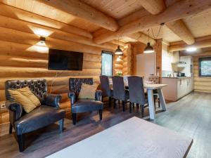 a kitchen and dining room with a table and chairs at Jenig 4A in Jenig