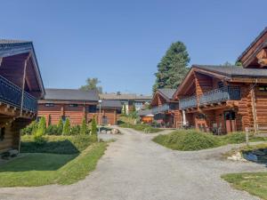 a dirt road between two wooden buildings at Jenig 4B in Jenig