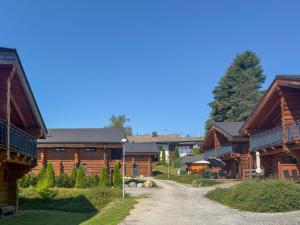 a path in front of a log home at Jenig 4A in Jenig