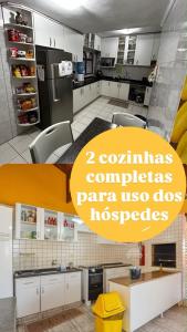 a kitchen with white cabinets and a yellow sign at Casa do Loro Hospedagem in Curitiba