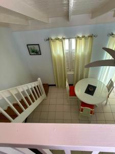 a bathroom with a sink and a toilet and a staircase at A World Away in Montego Bay +20 photos