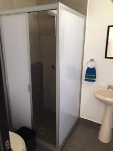a bathroom with a shower and a sink at Beautiful Apartment Executive 3 in Guadalupe +30 photos