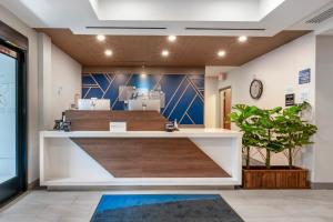 a salon with a reception desk in a room at Holiday Inn Express Selinsgrove by IHG in Shamokin Dam