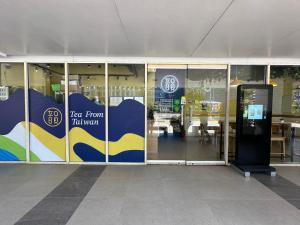 a store front with a sign on the glass doors at Kathys Crib at Shell Residences in Manila +54 photos