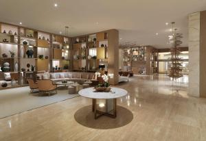 a living room with a couch and a table at Paradisus by Meliá Grand Cana - All Suites - All Inclusive in Punta Cana