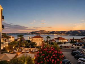 a view of a town with a body of water at Hotel B&B Villa Paula in Trogir
