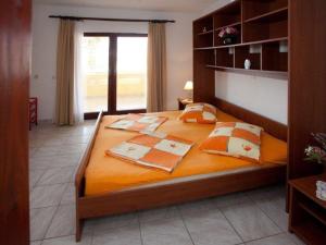 Postel nebo postele na pokoji v ubytování Apartments Dario