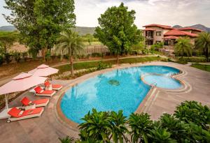 an image of a swimming pool at a resort at AamaGhati Wildlife Resort, Ranthambore in Sawāi Mādhopur