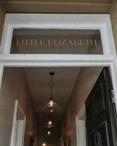a sign above a door that reads little blankeettel at Little Elizabeth in West Hobart
