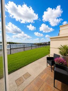 a patio with a view of the water at SeaView Apartment Suite in Cobh