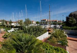 a marina with boats docked in a harbor at Residence Maestrale in Caorle