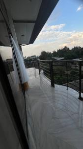 a view of a balcony with a view of a field at Bishoftu Bliss in Debre Zeyit
