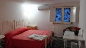 Postel nebo postele na pokoji v ubytování Le Coccole