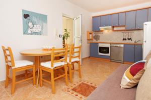 Kuchyň nebo kuchyňský kout v ubytování Apartments Villa Adria Bol
