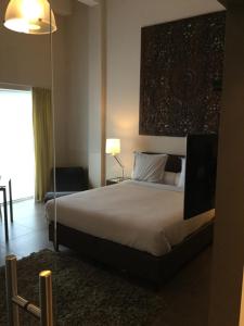 A bed or beds in a room at B&B Wellness Yoake