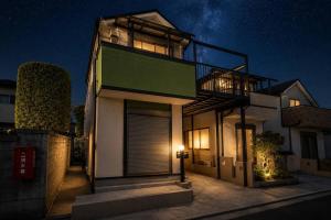 a house at night with a light lit up at HORIKIRI House TOKYO in Tokyo
