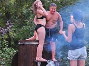 a man and two girls standing in a fire hydrant at Maria Chyc wynajem pokoi gościnnych in Zakopane +14 photos
